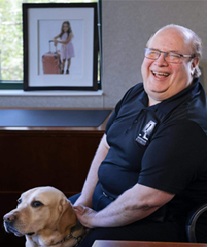 Jose Lopez Masso and guide dog Louis