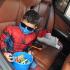 Lighthouse of Broward client Matthew Caraballo dressed as Spiderman shows off his candy